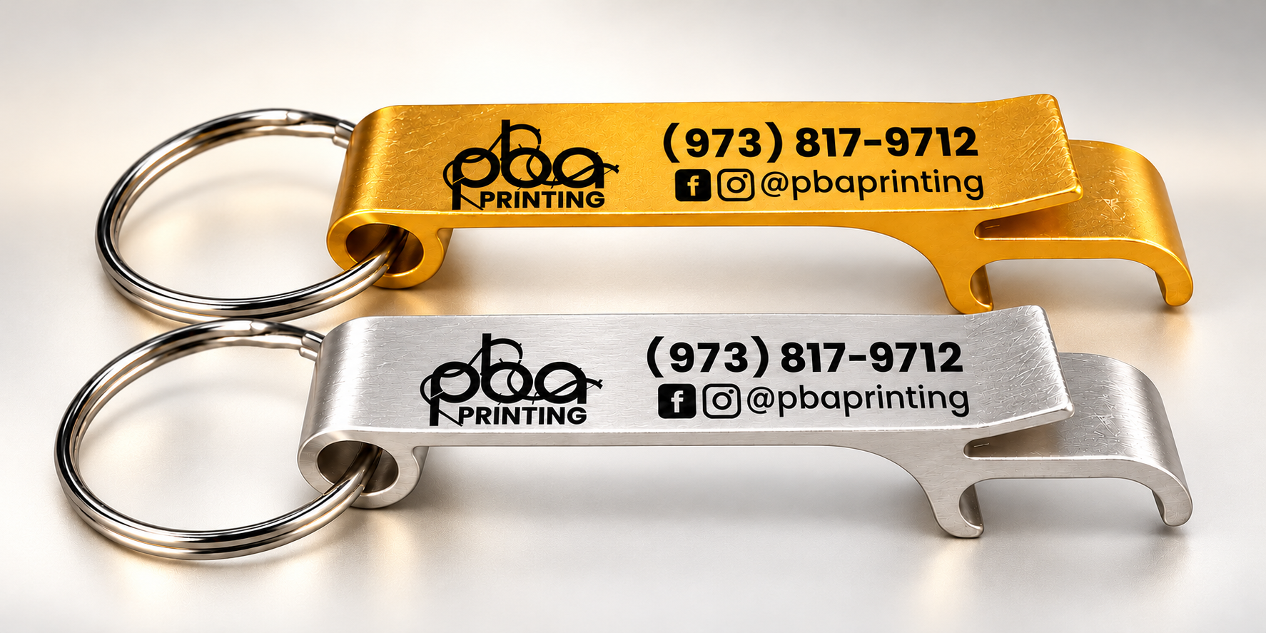 Premium studio photo showing gold and silver custom UV-printed bottle opener keychains